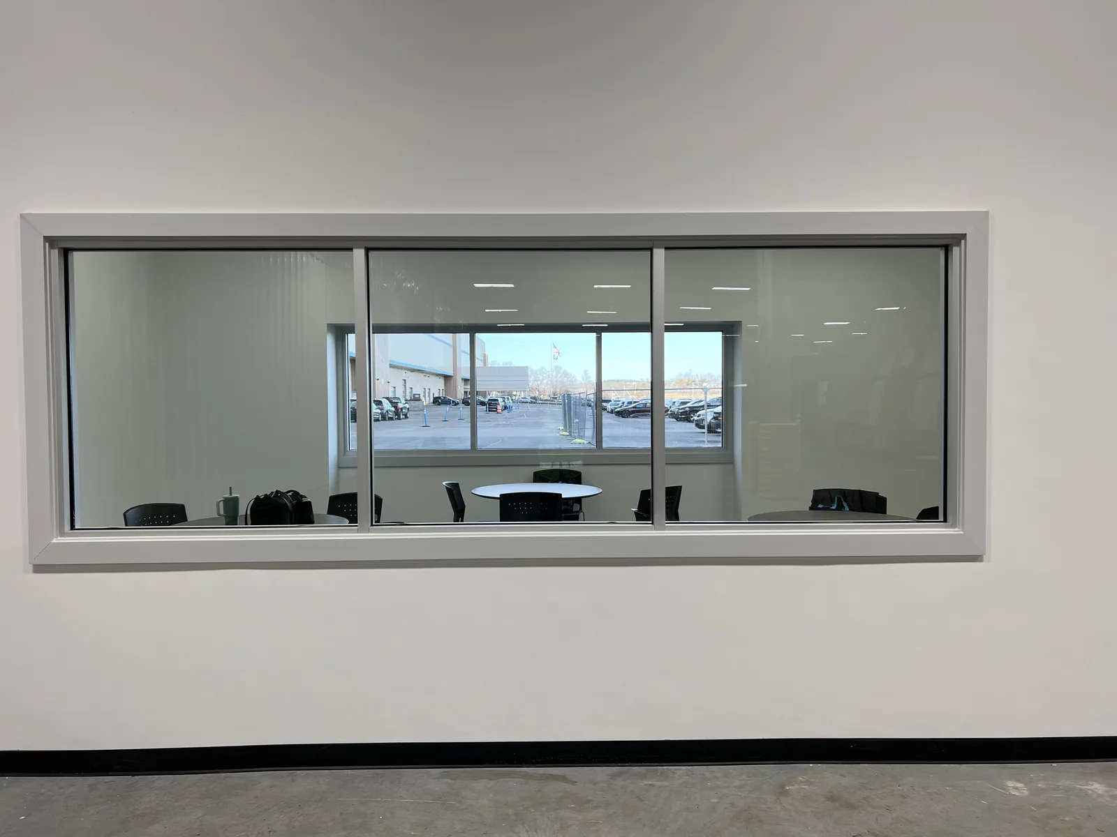 Commercial project — finished breakroom with parking view